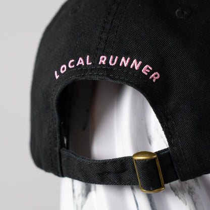 A Black cap with 'LOCAL RUNNER' embroidery